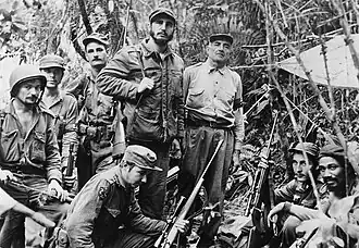 Image 15Fidel Castro and his men in the Sierra Maestra, 2 December 1956 (from History of Latin America)
