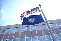 Flag of Nebraska flown from a school