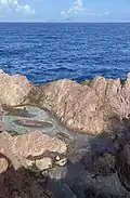Flat Point Tide Pools, with St. Eustatius in the distance