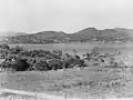 Port Henry from Fort St. Frédéric, Crown Point. Photograph shows view across Lake Champlain at hills in the distance on December 23, 1902.