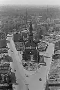 Total loss of Leipzig sacred building: View from the New Town Hall to the ruins of the Trinity Church, in 1954 the church ruins were blown up. The community received a building permit for a new church, which was then withdrawn by the SED government.[177]