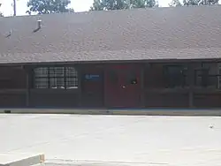 The U.S. Post Office in Fouke is of log cabin design.
