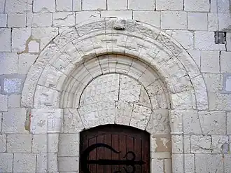 The doorway of the church in Tessel
