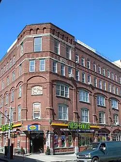 Rockwood & Company building in 2012, with a market on the ground floor