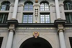 Architectural detail of the gate, with gilded inscriptions.
