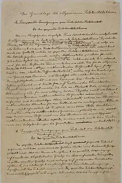 A yellowed piece of paper with two main paragraphs of black, handwritten text and some marginalia, strikethroughs, and underlines