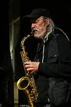 Photo of Mexican musician Germán Bringas playing a saxophon