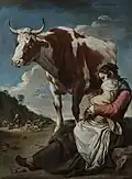 Mother and child with a cow in a rocky landscape