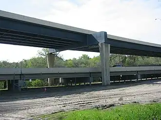 Two different girder bridges. The top is a plate girder bridge, while the bottom is a concrete girder bridge.