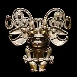 Anthropomorphic pendant; 18th century; gold; height: 13 cm (5.1 in), width: 13 cm (5.1 in), depth: 4.5 cm (1.7 in); Musée du Quai Branly (Paris)