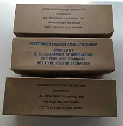 Three packages of government cheese