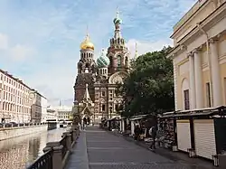 Griboyedov Canal Embankment in St. Petersburg. In the backdrop, Church of the Savior on Blood