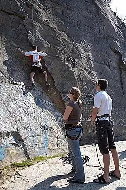Guide climbing the quarry in Chwałkowie