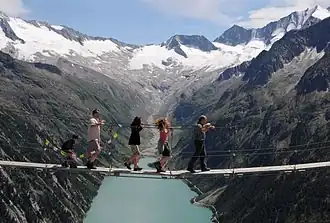 A simple suspension footbridge in the Zillertal Alps