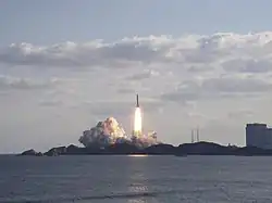 The H-IIA F11 launch vehicle lifting off from Tanegashima Space Center