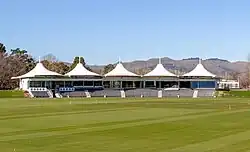 view of cricket stand in front of a pavilion