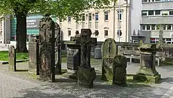 Group of epitaphs next to the chapel