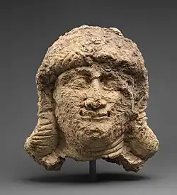 Female head; circa 2000–1600 BC; ceramic; 18 x 12.7 cm; Metropolitan Museum of Art (New York City)