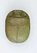 Heart scarab of the singer of Amun Iakai; 1550–1186 BC; glass; length: 4.8 cm, width: 3.5 cm, height: 1.5 cm; Metropolitan Museum of Art (New York City)