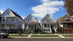 A typical block in Hermosa is composed of worker's cottages and 2-flats.