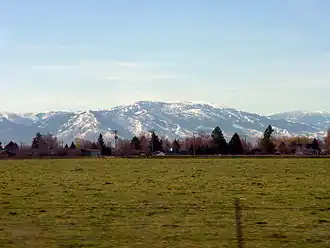 A photo of the Albion Mountains viewed from Heyburn in winter