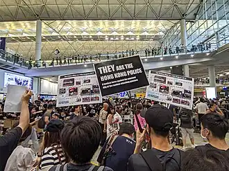Signs held by protesters