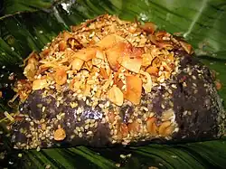 Htamanè – glutinous rice with fried coconut, roasted peanuts, sesame and ginger