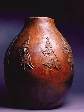 Pot with Dancers with Headdresses and Rattles, ca. 1985 by Faye Tso, fired clay with piñon pitch