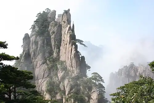 Huangshan with trees and clouds