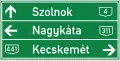 Tabular road sign on major road (three directions)
