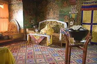 The former quarters of the Dalai Lama. The figure in the throne represents Tenzin Gyatso, the incumbent Dalai Lama. The throne bears the Chinese character 夀, meaning "long life".