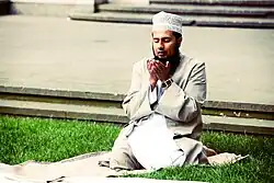 Raising hands in Dua.