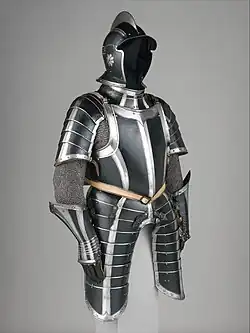 Black painted suit of German armor crafted circa 1600.[27]