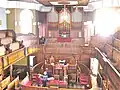 Interior view at Plough Lane Chapel, Lion Street, Brecon looking towards organ.