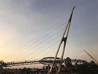 Darul Hana Bridge at dusk, with The Astana was seen visible below