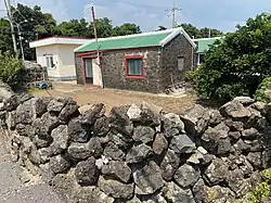 The island's volcanic basalt rock was traditionally used as a building material