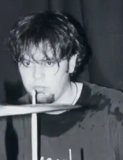 A photo of drummer J. Elliott