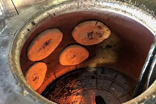 Baking in clay oven