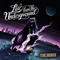 The cover features a drawing of a purple vehicle, halfway deep into the ground while emitting smoke, under a full moon. The album title appears on the top left corner and the artist's logo in on the bottom right corner.