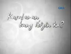 An image with a gray background, with white details. The series title is displayed on the upper center of the image. The logo of GMA Network is displayed on the upper right side of the image.