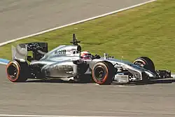After losing the Vodafone sponsorship in 2013, the McLaren MP4-29 ran with a silver only car, with the car's name on the sidepod, as seen driven by Kevin Magnussen (2014).
