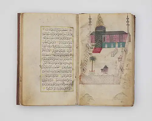 a book opened to an illustration of a building