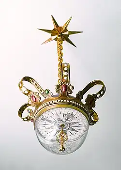 A tell-tale crown compass hanging from the ceiling