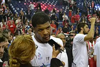 Kyle Hines shortly after Olympiacos 2013 back-to-back EuroLeague victory