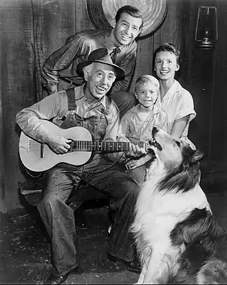 From left to right—George Chandler (as Uncle Petrie), Jon Shepodd (the original Paul Martin), Jon Provost (as Timmy Martin) and Cloris Leachman (the original Ruth Martin) during season 4 when the show transitioned from the Millers to the Martins