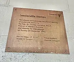 A metal plaque on a wall