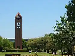 The bell tower and mall at the center of campus