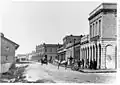 Looking north on Wharf street from Fort street, Victoria. 1866–1870.
