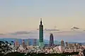 Taipei Nan Shan Plaza, visible on the right of Taipei 101.