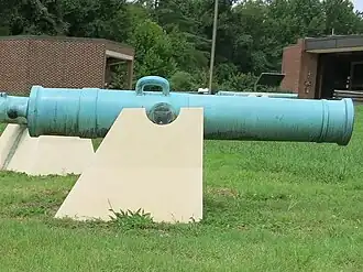 Photo shows side view of a 32-pdr howitzer at Petersburg.